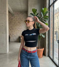 Cartoon Eyes Black Baby Tee – Stretch Fit Graphic Crop Top for Women | physical by 303™ (formerly 303)