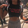 My Taste in Men is a form of self harm Baby Tee Crop Top | physical by 303™ (formerly 303)