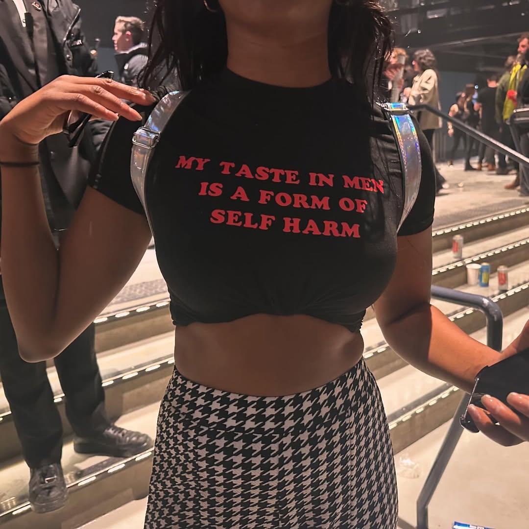 My Taste in Men is a form of self harm Baby Tee Crop Top | physical by 303™ (formerly 303)
