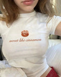 Sweet Like Cinnamon Baby Tee – White Aesthetic Crop Top for Gen Z Girls | physical by 303™ (formerly 303)
