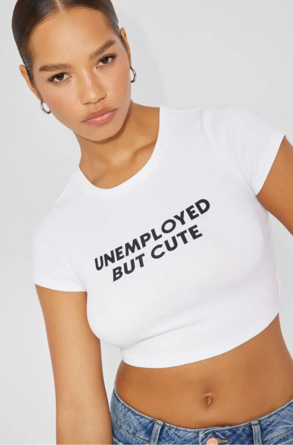 Trendy “Unemployed But Cute” Baby Crop Top – Color White | physical by 303™ (formerly 303)